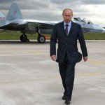 Russian Prime Minister Vladimir Putin walks near a new Russian fighter jet Sukhoi T-50, after its flight in Zhukovksy, outside Moscow on June 17, 2010. AFP PHOTO / RIA NOVOSTI / POOL / ALEXEY DRUZHININ (Photo credit should read ALEXEY DRUZHININ/AFP/Getty Images)